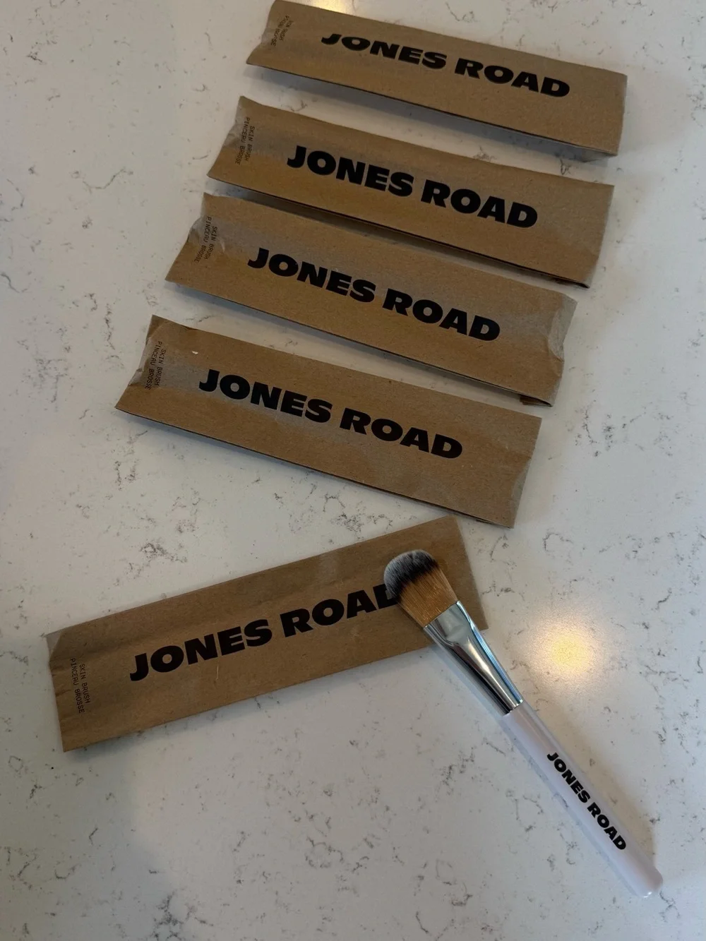 Jones Road Skin Brush with Soft White Handle and Natural Bristles